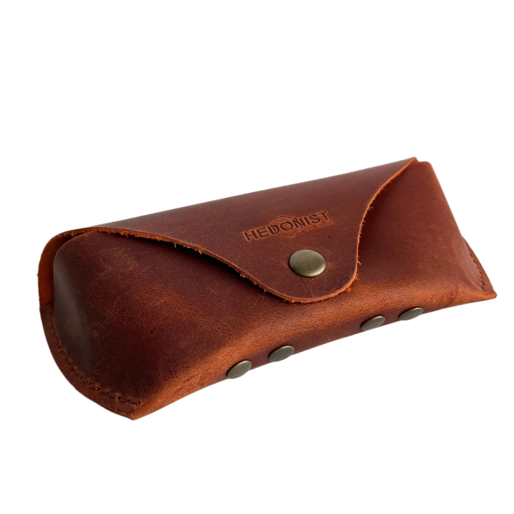 Soft Leather Eye Glasses Case in Cognac, angled view showing stitched edge and rivets