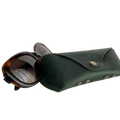 Soft Leather Eye Glasses Case in Dark Green with tortoiseshell sunglasses beside it