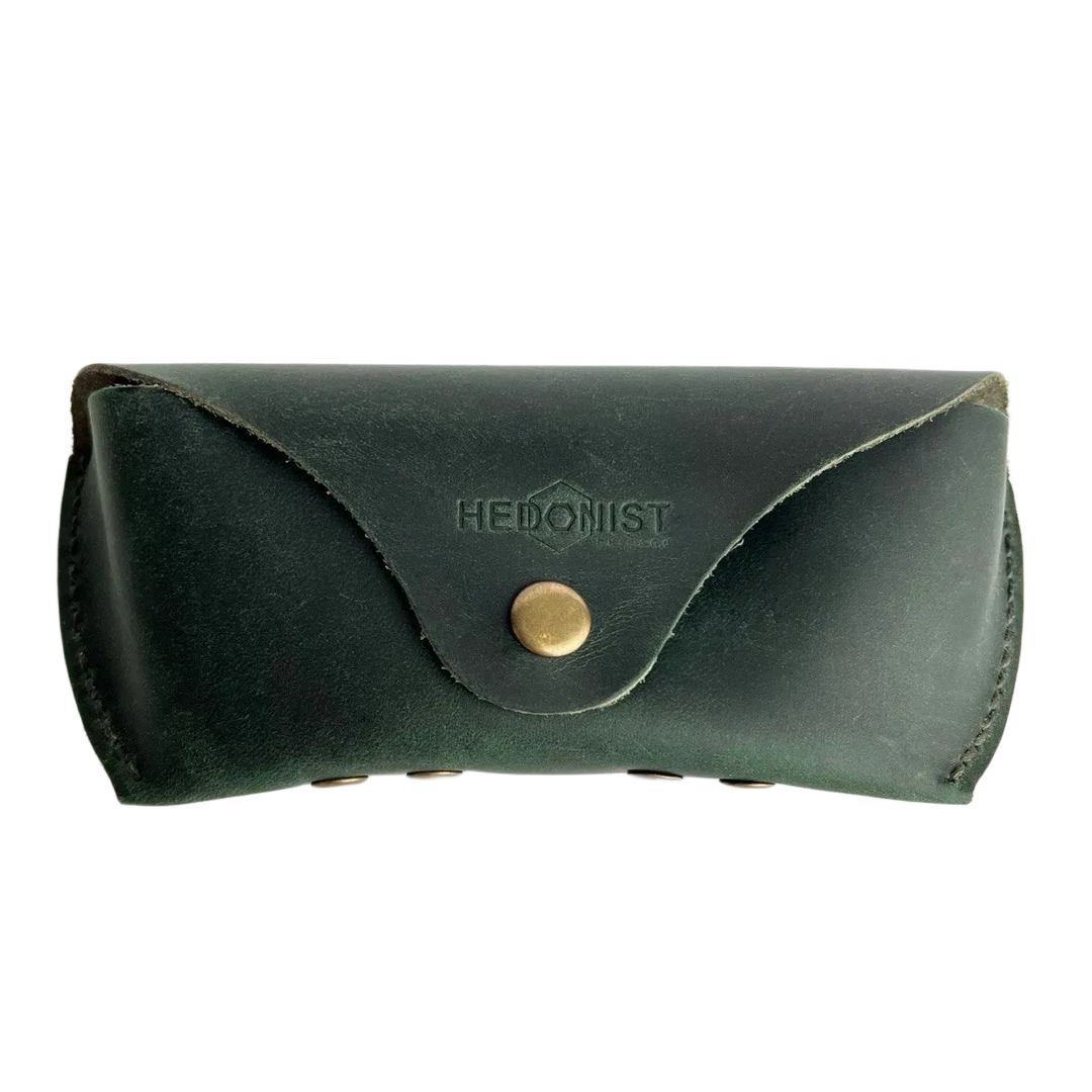 Soft Leather Eye Glasses Case in Dark Green, closed, front view with embossed Hedonist logo and snap closure
