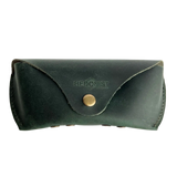 Soft Leather Eye Glasses Case in Dark Green, closed, front view with embossed Hedonist logo and snap closure