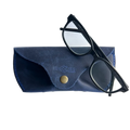Soft Leather Eye Glasses Case in Navy Blue with black-framed eyeglasses resting on top