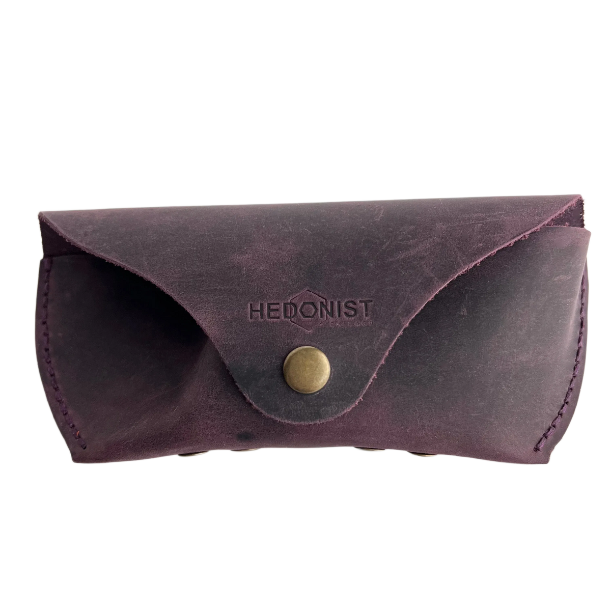 Soft Leather Eye Glasses Case in Plum, closed, front view with embossed Hedonist logo and snap closure