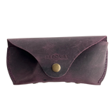Soft Leather Eye Glasses Case in Plum, closed, front view with embossed Hedonist logo and snap closure
