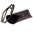 Soft Leather Eye Glasses Case in Plum with tortoiseshell sunglasses beside it