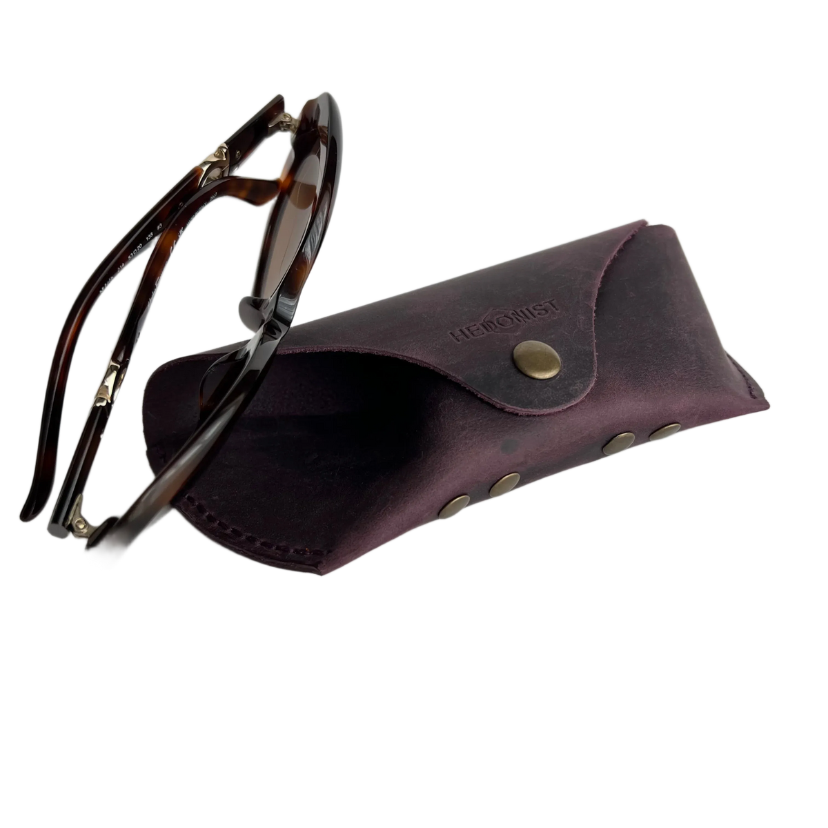 Soft Leather Eye Glasses Case in Plum with tortoiseshell sunglasses beside it