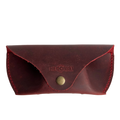 Soft Leather Eye Glasses Case in Red, closed, front view with embossed Hedonist logo and snap closure