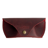Soft Leather Eye Glasses Case in Red, closed, front view with embossed Hedonist logo and snap closure