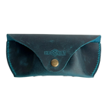 Soft Leather Eye Glasses Case in Teal, closed, front view with embossed Hedonist logo and snap closure