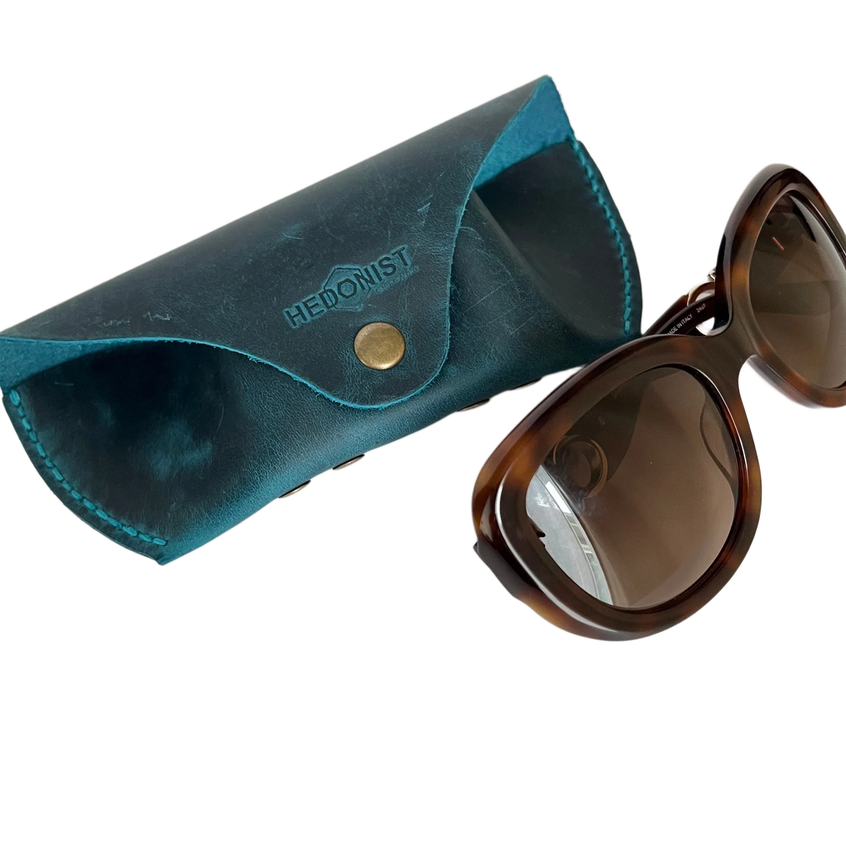 Soft Leather Eye Glasses Case in Teal with tortoiseshell sunglasses beside it