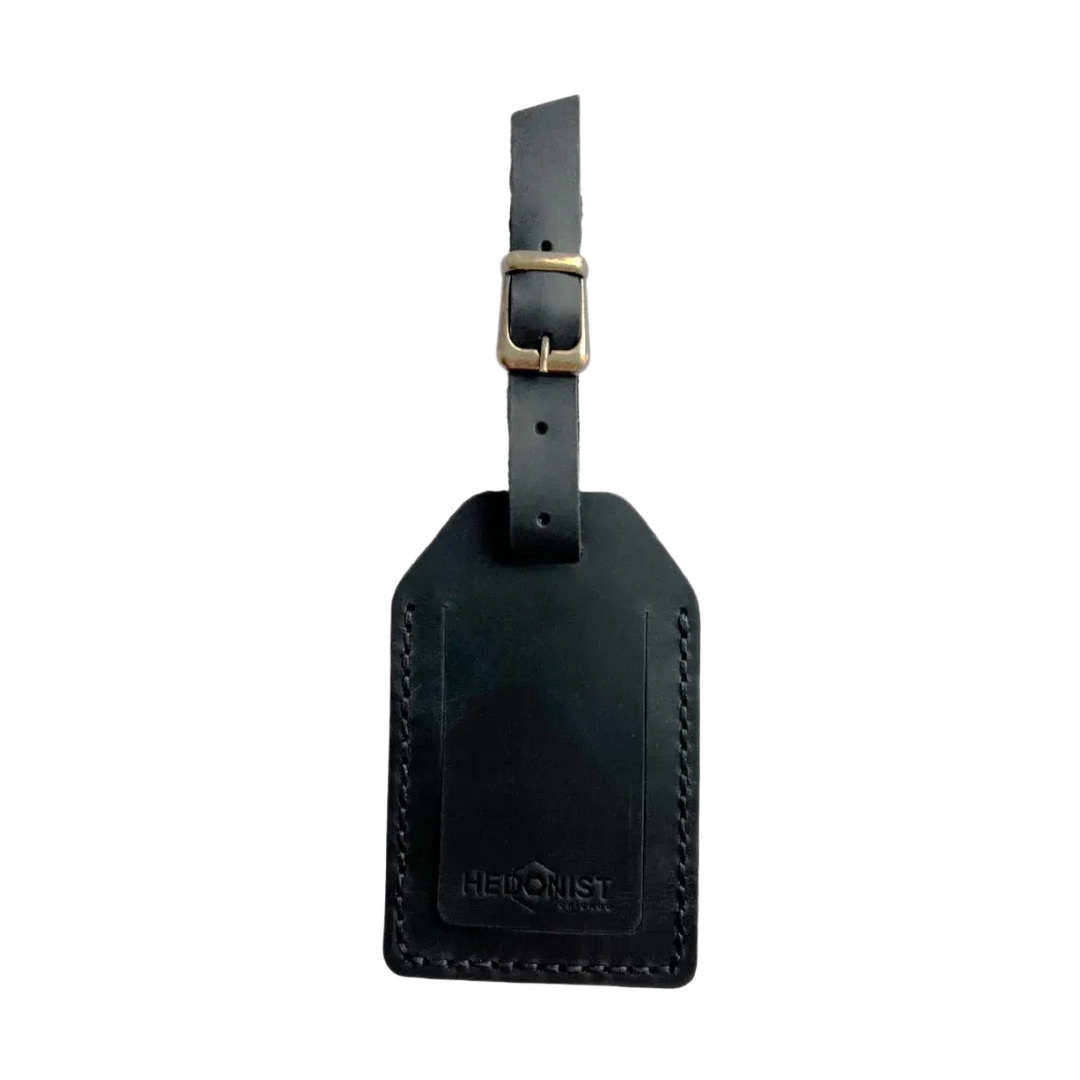 Handmade Leather Luggage Tag in Black - closed front view with logo