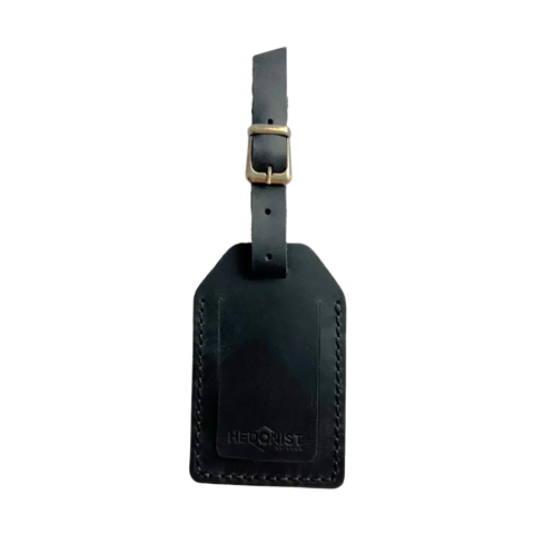 Handmade Leather Luggage Tag in Black - closed front view with logo