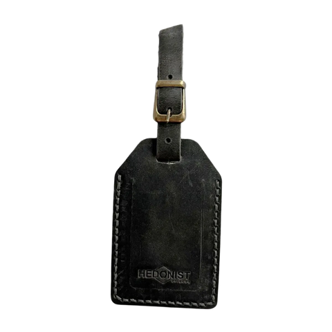 Handmade Leather Luggage Tag in Black Washed - closed front view with logo