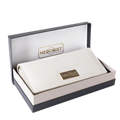 Gray leather trifold wallet presented in Hedonist Chicago branded gift box