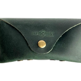 Soft Leather Eye Glasses Case in Dark Green, closed, front view with embossed Hedonist logo and snap closure