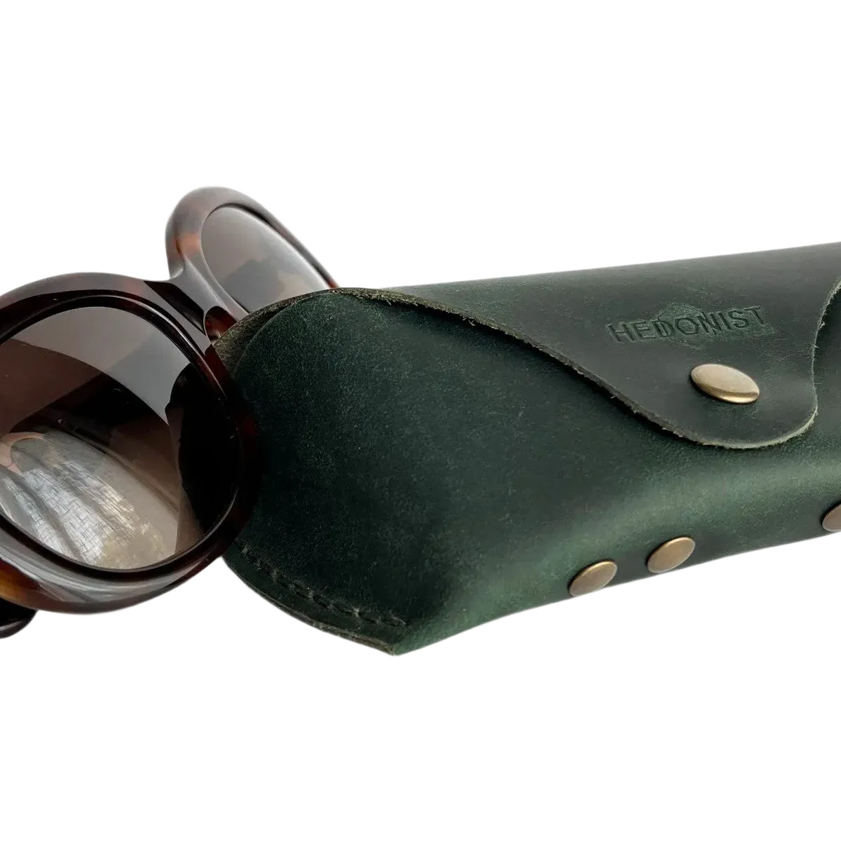 Soft Leather Eye Glasses Case in Dark Green with tortoiseshell sunglasses beside it