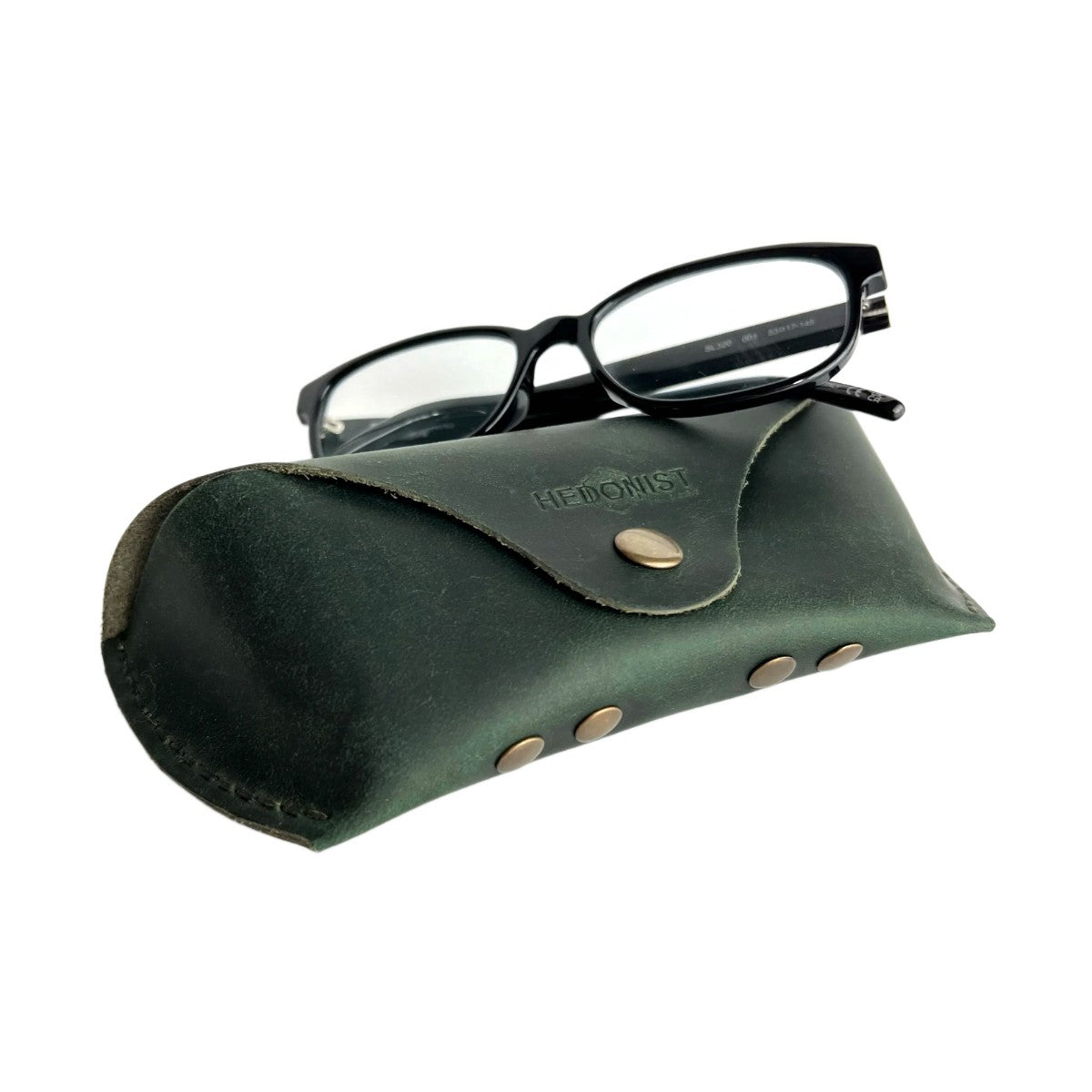 Soft Leather Eye Glasses Case in Dark Green with black-framed eyeglasses resting on top