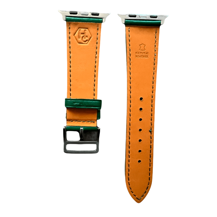 Green leather Apple Watch band, texture and buckle detail close-up