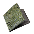 An olive green bifold wallet with a crocodile-embossed texture on the front cover, shown partially open to reveal a dark brown interior. 