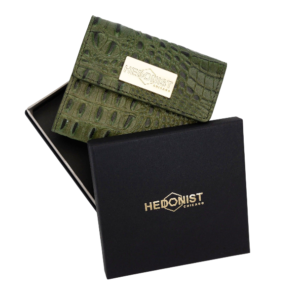 Small green croco-embossed snap wallet for women, presented in branded box