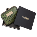 Small green croco-embossed zip wallet for women, presented as a gift