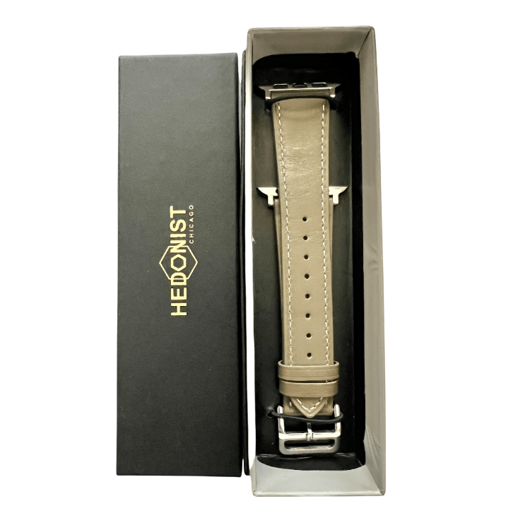 Grey leather Apple Watch band, presented in gift box
