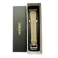 Grey leather Apple Watch band, presented in gift box