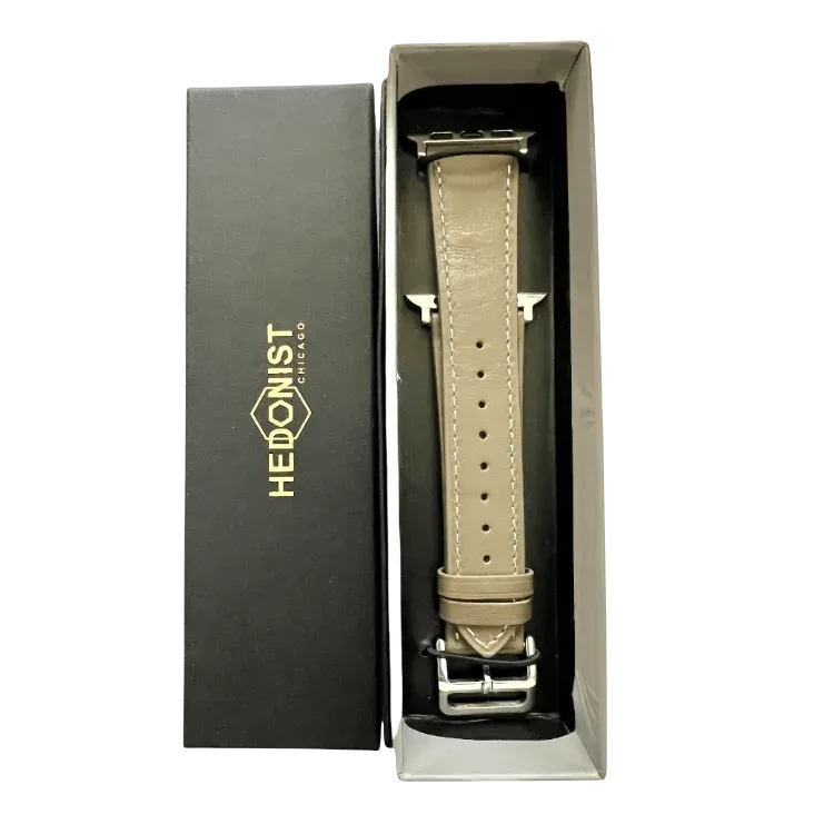 Grey leather Apple Watch band, presented in gift box