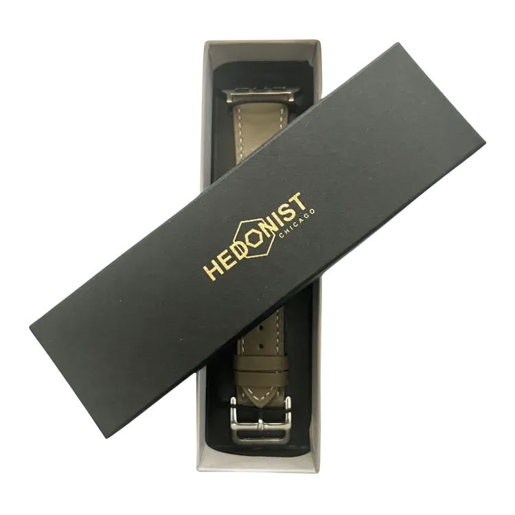 Grey leather Apple Watch band, packaging close-up