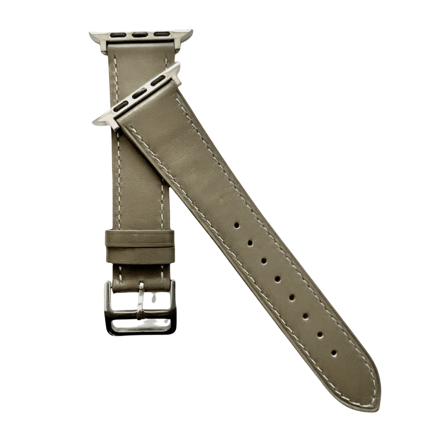 Grey leather Apple Watch band, texture and buckle detail close-up