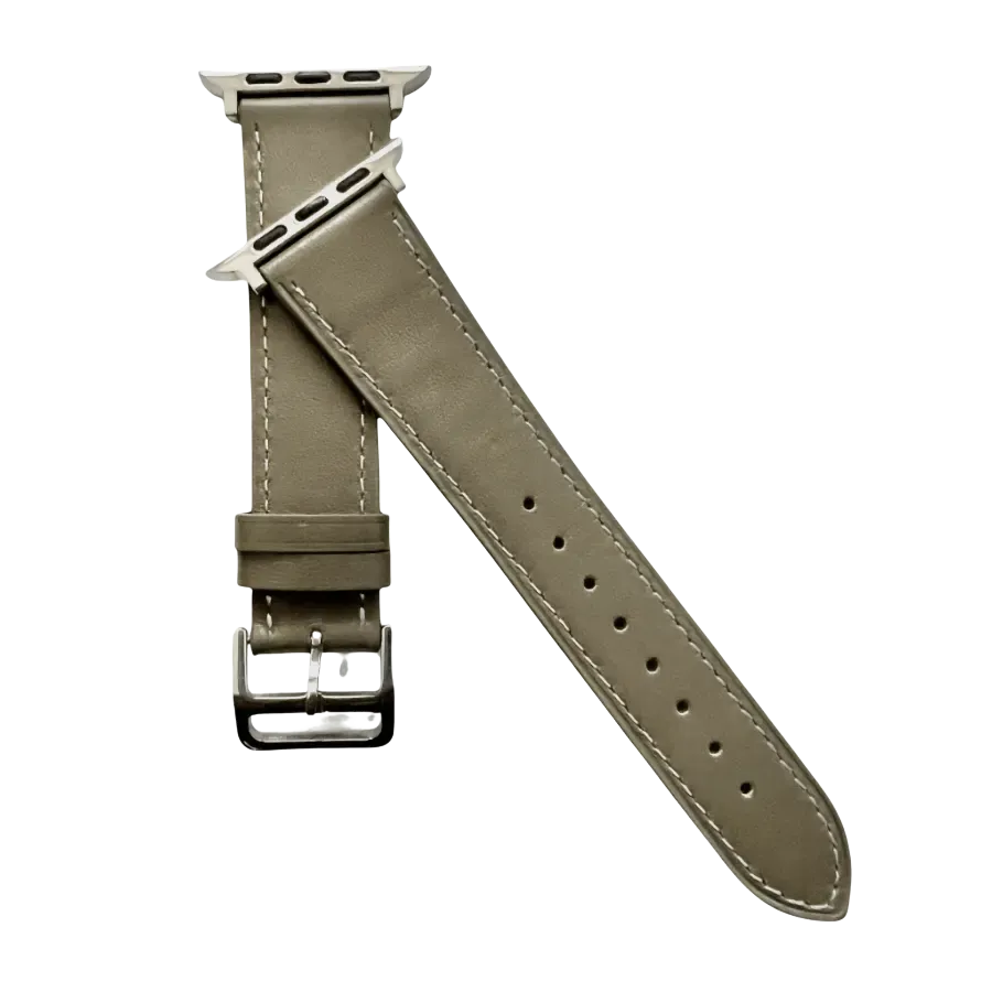 Grey leather Apple Watch band, texture and buckle detail close-up