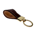 Hedonist Chicago brown key chain in brown, slim profile, full grain leather, angled view