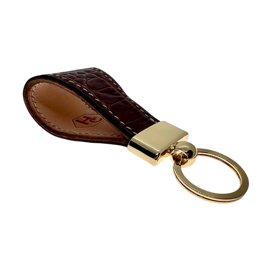 Hedonist Chicago brown key chain in brown, slim profile, full grain leather, angled view