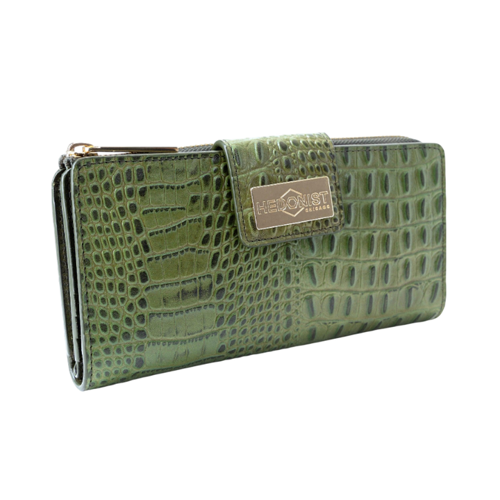 Green croco-embossed leather travel wallet closed, front view with zip-around closure
