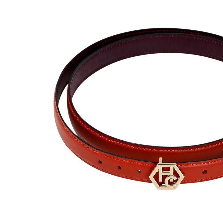Buckle close-up on women's reversible design leather belt - pink-red - Hedonist Chicago (1", reversible with black)