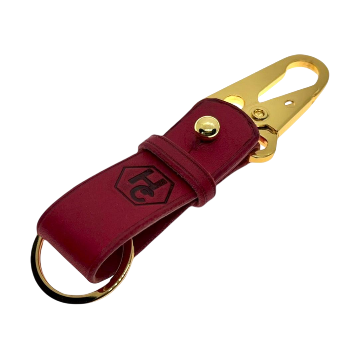 Hedonist Chicago red key chain in red, slim profile, full grain leather, angled view