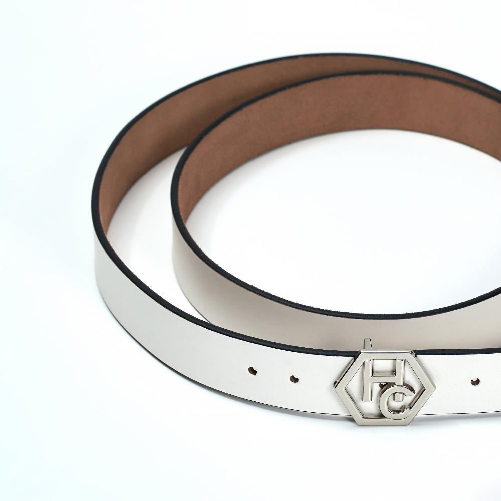 Buckle close-up on women's seamless edge leather belt - white - Hedonist Chicago
