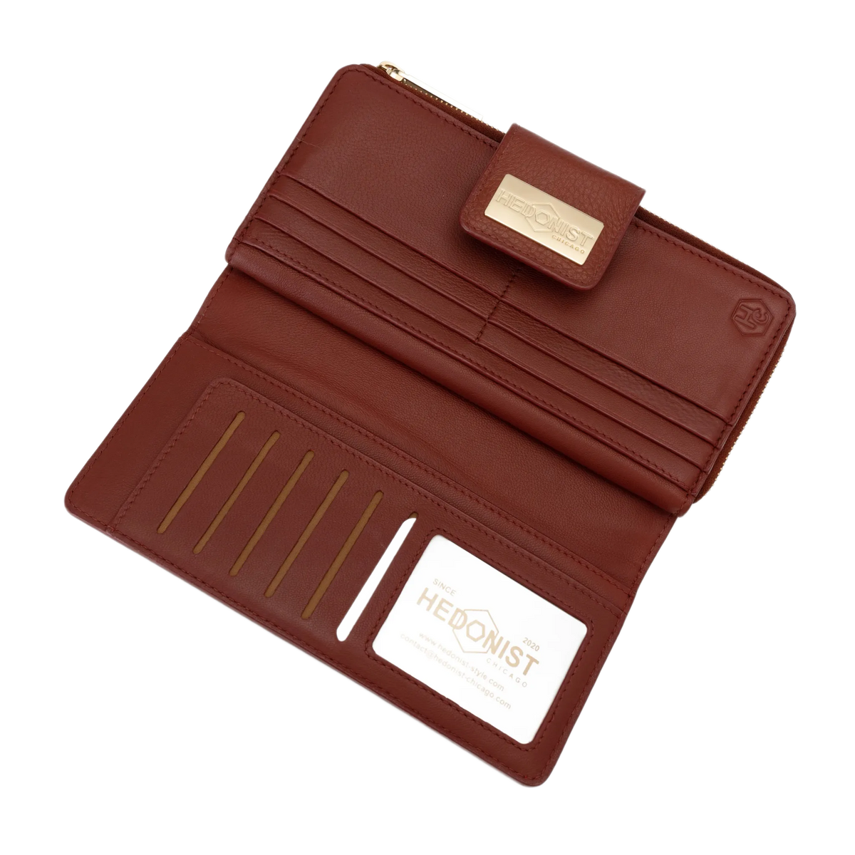 Large red pebbled leather travel wallet open showing ID window and card slots
