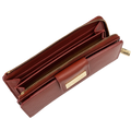 Large red pebbled leather travel wallet open showing zip-around perimeter and interior card slots