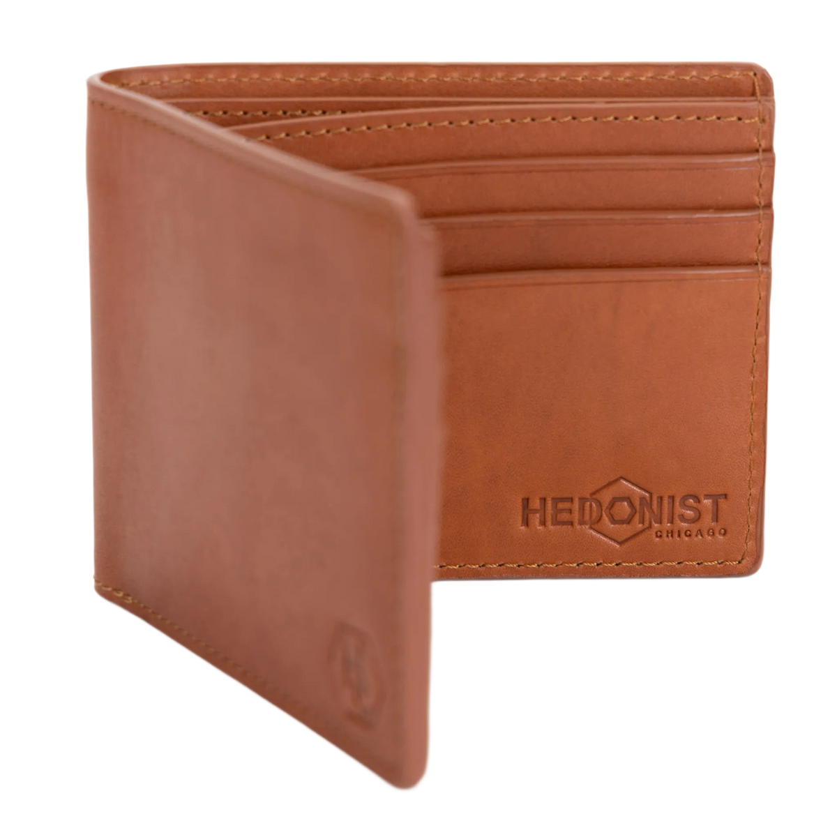 Light brown leather bifold wallet open, close-up of card slots on inner flap