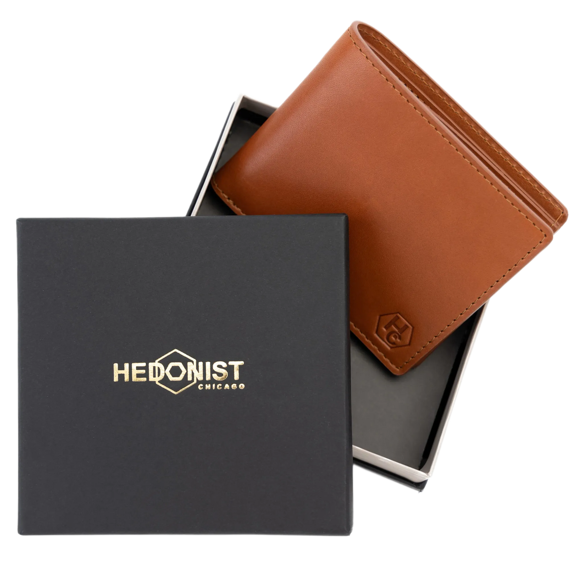 Light brown leather bifold wallet displayed with Hedonist Chicago branded packaging