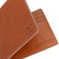 Close-up of the embossed logo on light brown leather bifold wallet interior