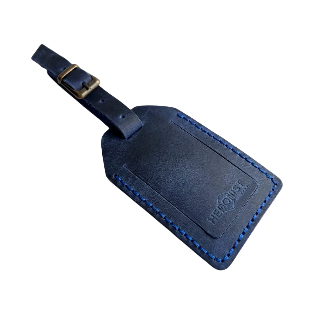 Handmade Leather Luggage Tag in Navy Blue - closed front view with logo