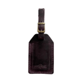 Handmade Leather Luggage Tag in Plum - closed front view with logo