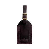 Handmade Leather Luggage Tag in Plum - closed front view with logo