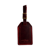 Handmade Leather Luggage Tag in Red - closed front view with logo