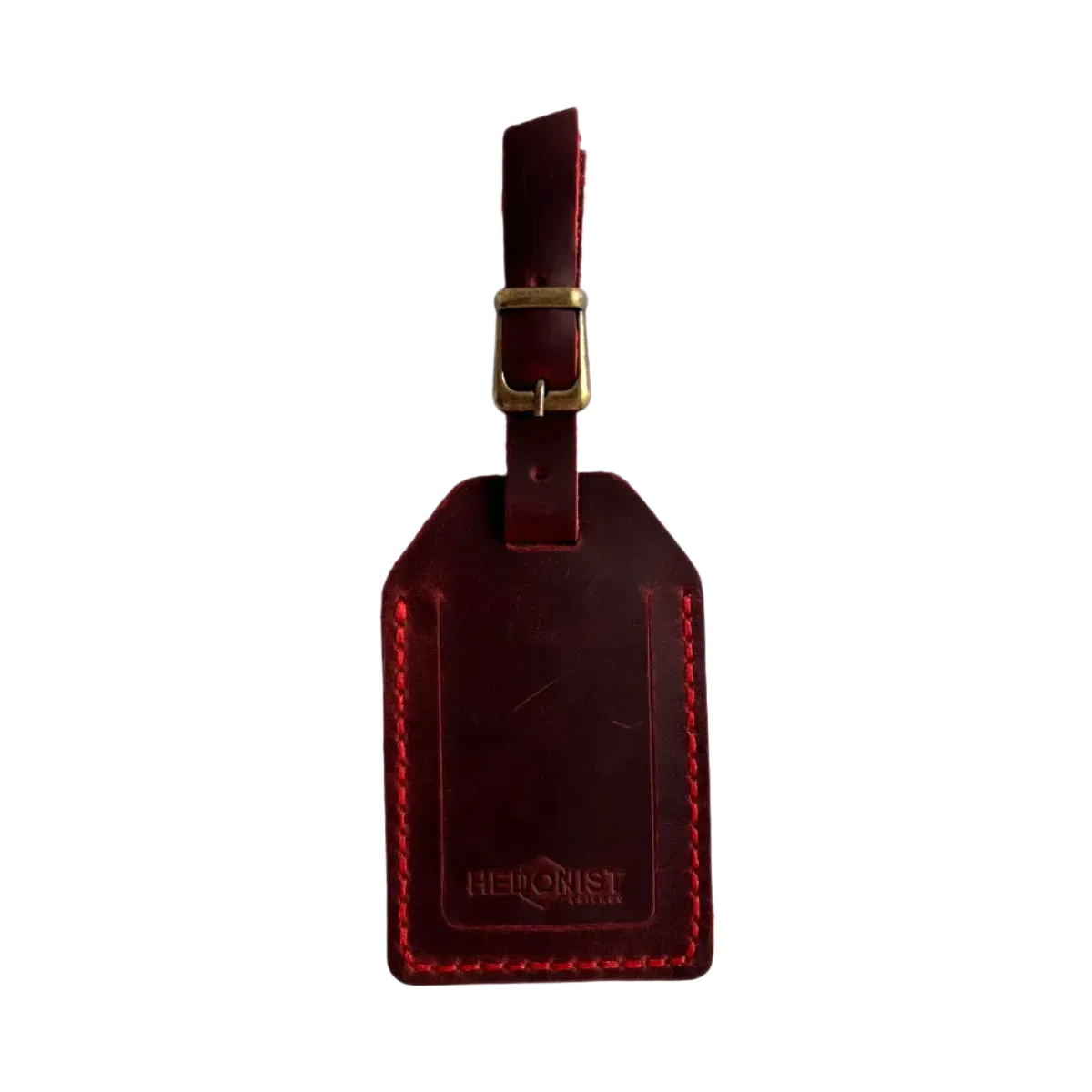 Handmade Leather Luggage Tag in Red - closed front view with logo