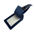 Navy blue full-grain leather luggage tag with matching adjustable strap and brass buckle, shown open with a printable ID insert card.