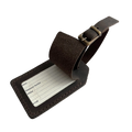 Dark brown full-grain leather luggage tag with matching adjustable strap and brass buckle, shown on a white background.