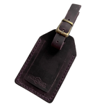 Plum full-grain leather luggage tag with matching leather strap and brass buckle, embossed Hedonist Chicago logo on a stitched leather patch.