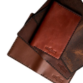 Handmade light mahogany leather card holder, 12 card slots fanned out view